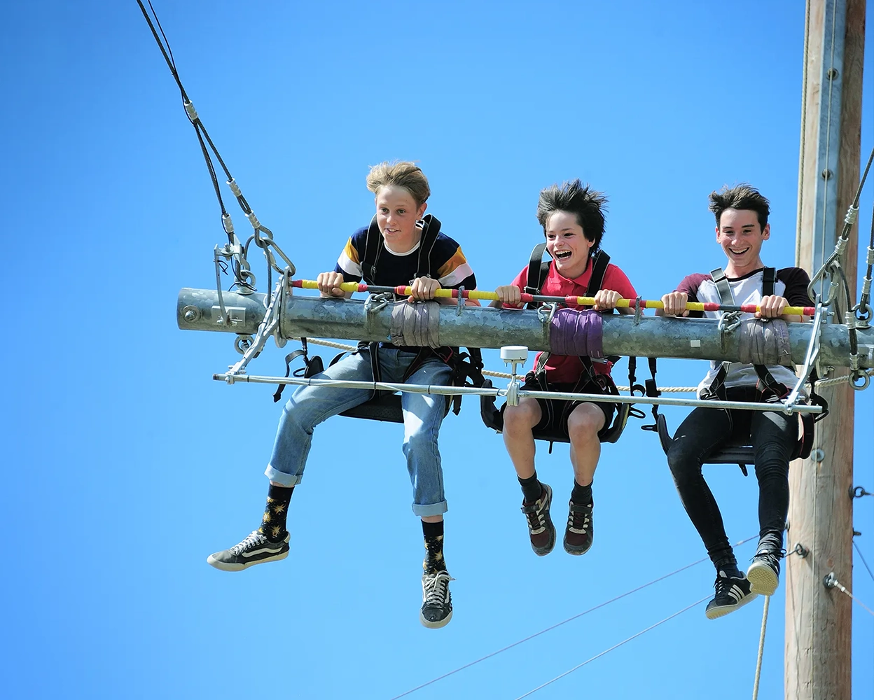Kids on the gravity swing at eden