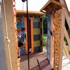 Hangloose climbing wall, with 2 young climbers on the wall